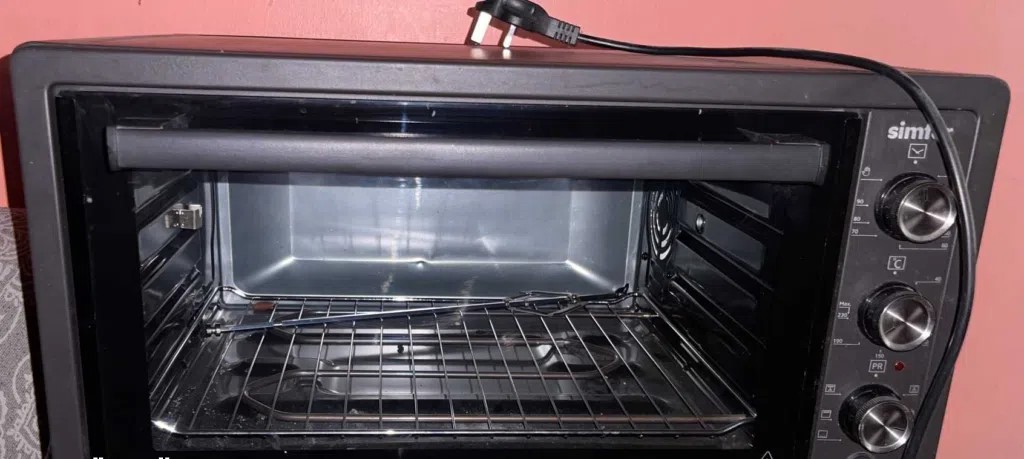 فرن كهربائي ⁦⁦simfer⁩⁩ تركي ⁦⁦1400w⁩⁩ مستعمل للبيع في الدوحه